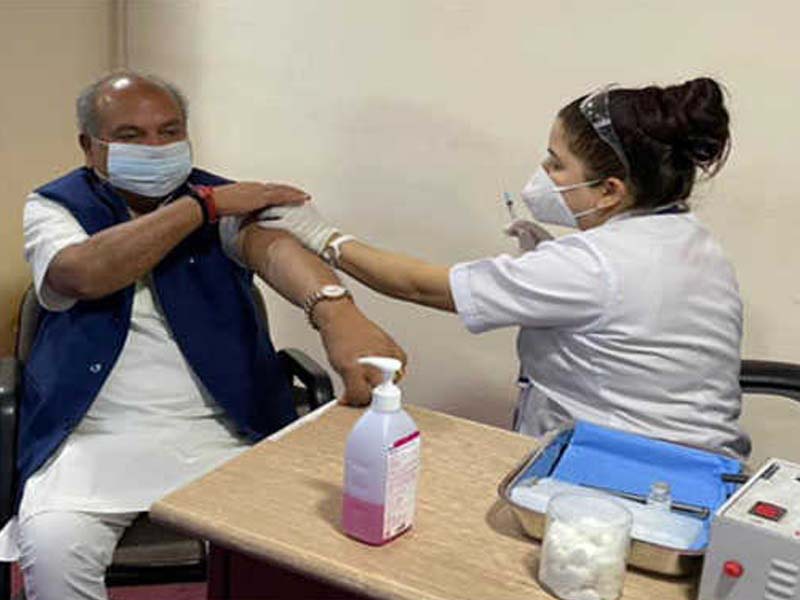 Minister Narendra Singh Tomar receives the second dose of the COVID-19 vaccine