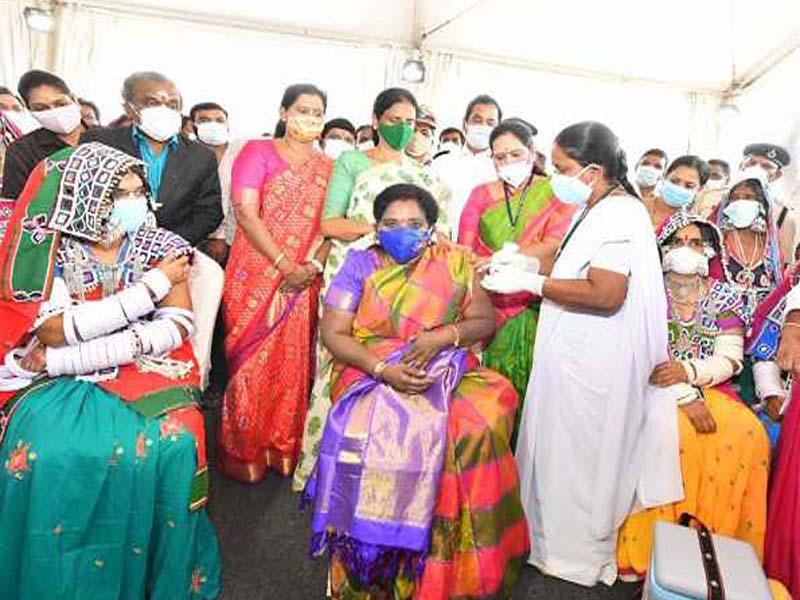 Telangana Guv creates history by taking vaccines in a tribal habitation in Telangana