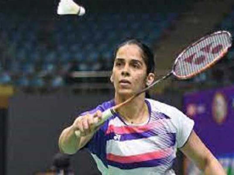Malvika stuns Nehwal, enters QF