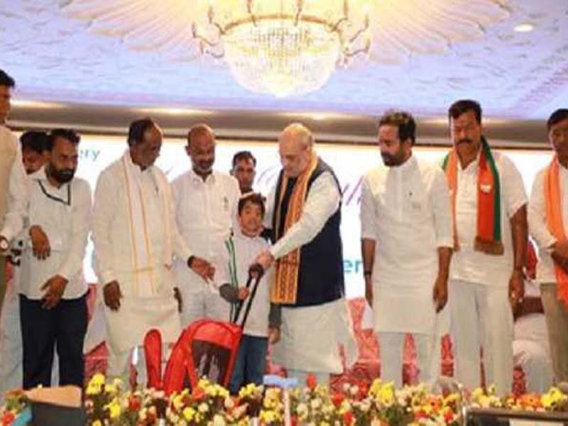 Amit Shah distributes types of equipment to differently-abled