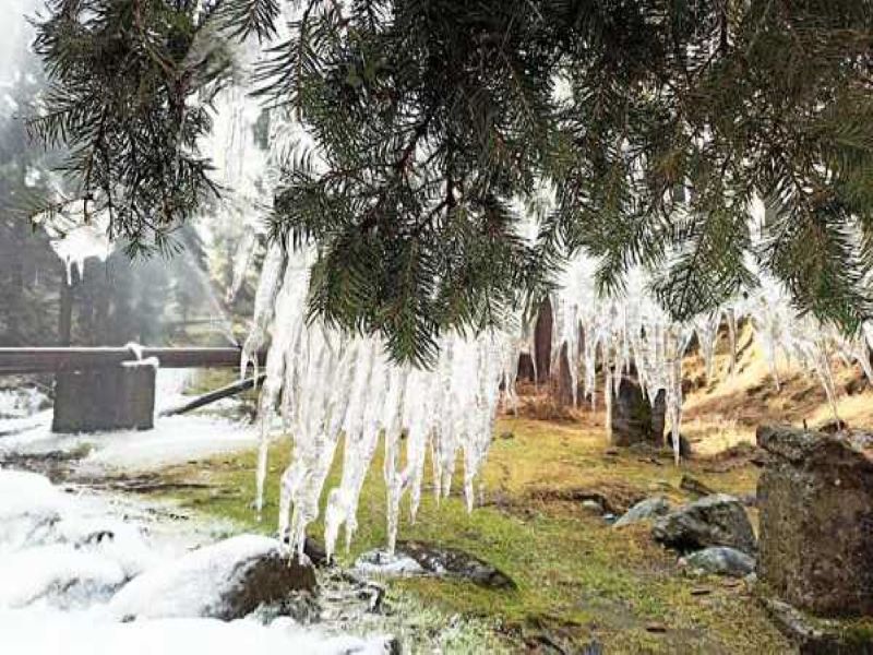 Freezing temperatures in Kashmir, with Srinagar recording the coldest night at -2.2 degrees Celsius.