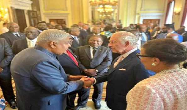 King Charles III and Commonwealth leaders converse with VP Dhankhar in London.