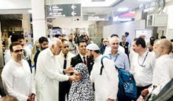 The first group of Hajj pilgrims flies into the airport in Srinagar