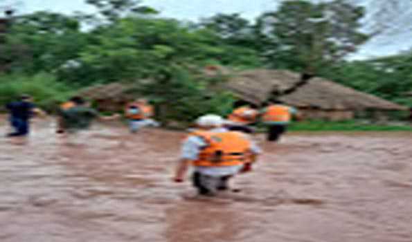 There is widespread flooding in the Jammu region due to heavy rain; Katra experiences its most rainfall since 1980; a bridge is damaged; and an alert sounds.