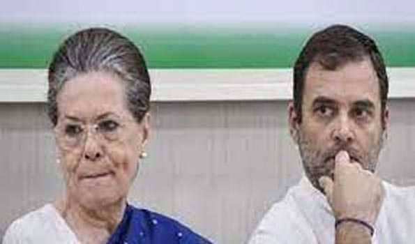 Sonia and Rahul honor Oomen Chandy