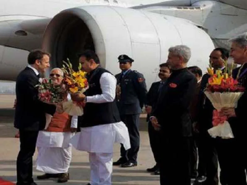 Arriving in Jaipur is French President Emmanuel Macron.