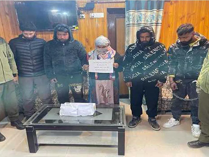 Police in Kashmir have booked a wanted woman drug smuggler under the PIT NDPS Act.