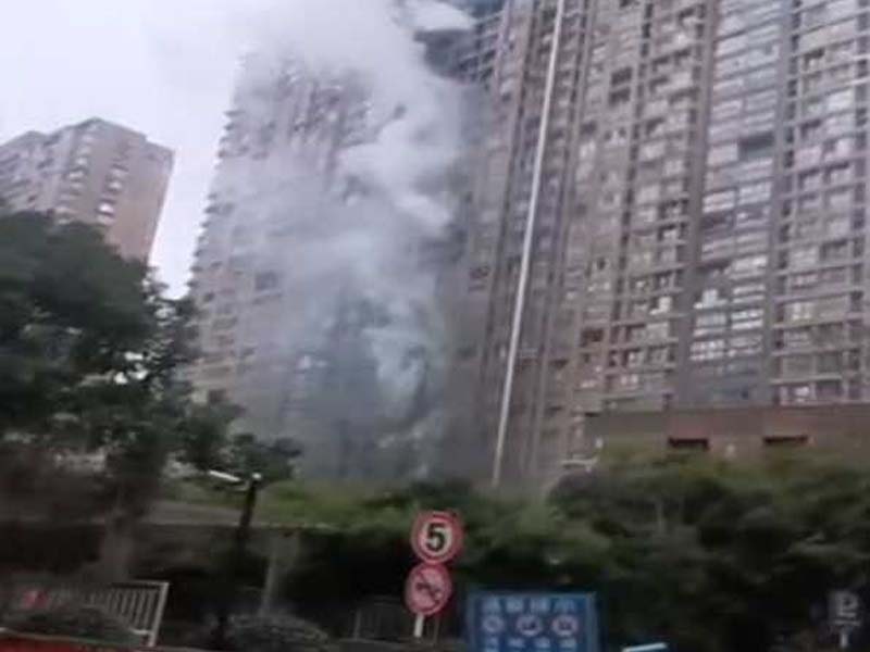 Building fire in East China claims 15 lives.