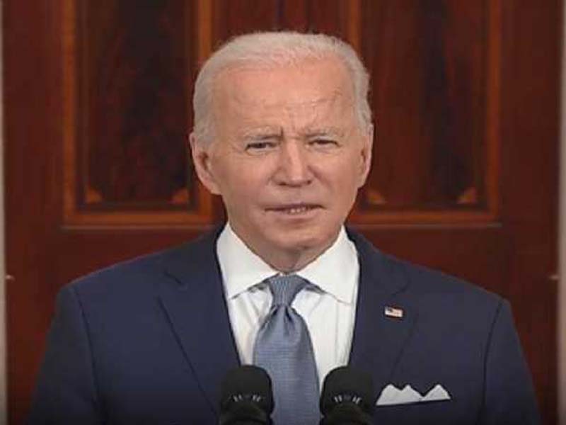 Shortly after the government funding bill’s deadline, Biden signs it.