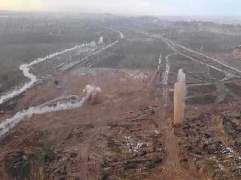 In northern Gaza, an Israeli army smashes a Hamas tunnel.