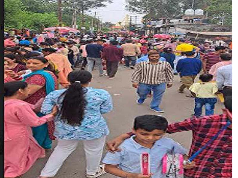 Thousands of people swarm the Ranbir Canal market in Jammu for the Baisakhi celebrations.