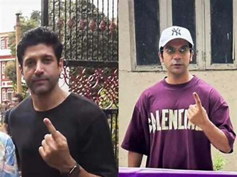 Bollywood actors wait in line with supporters to cast ballots in Mumbai