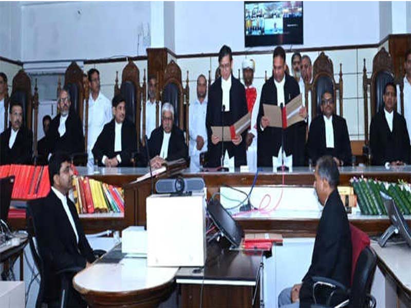 Justice Nargal is sworn in by the Chief Justice.