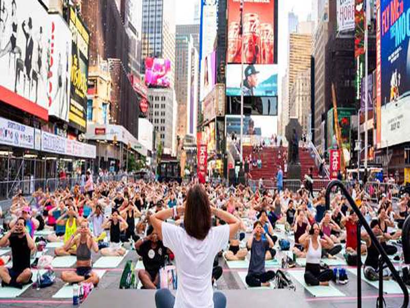 Yoga lovers celebrate International Yoga Day (IYD) with enthusiasm in Times Square, Dhaka, Fiji, Tokyo, and the UN.
