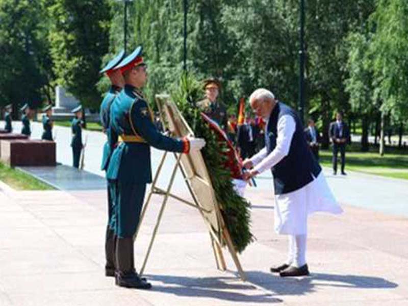 President Putin and PM Modi tour the Atom Pavilion in Moscow.