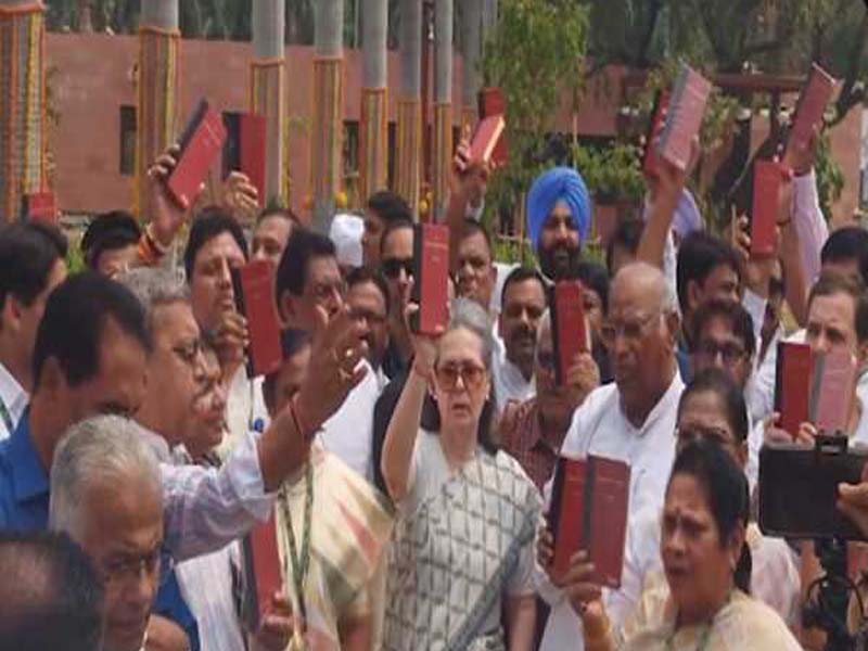 INDIA group staged a demonstration carrying a copy of the Constitution at the Parliament building.