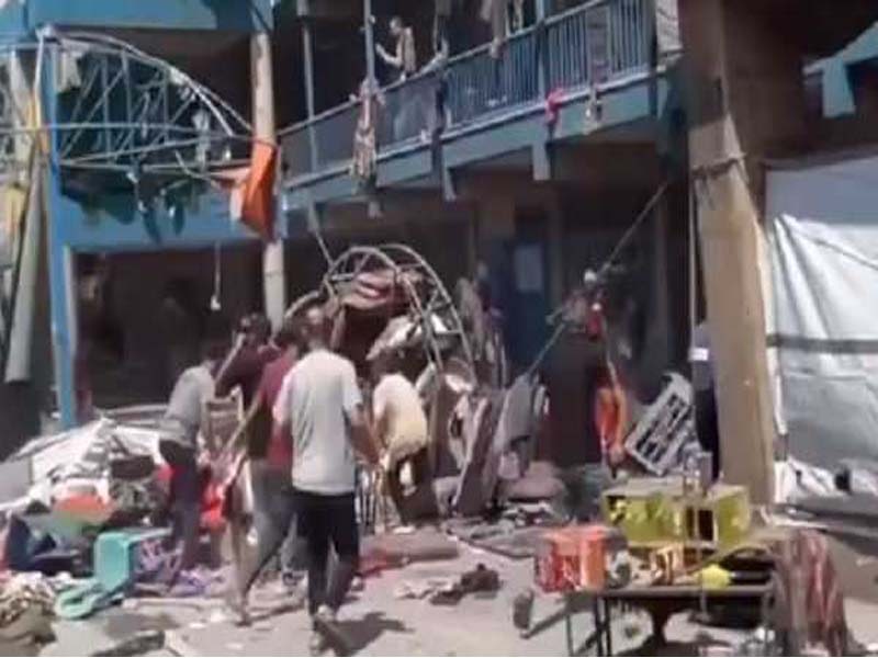 Israel launches an airstrike on central Gaza, killing nine Palestinians.