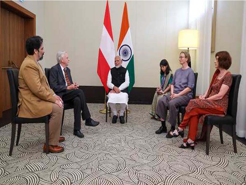 PM Modi meets four eminent Indian scientists and an Austrian physicist in Vienna.
