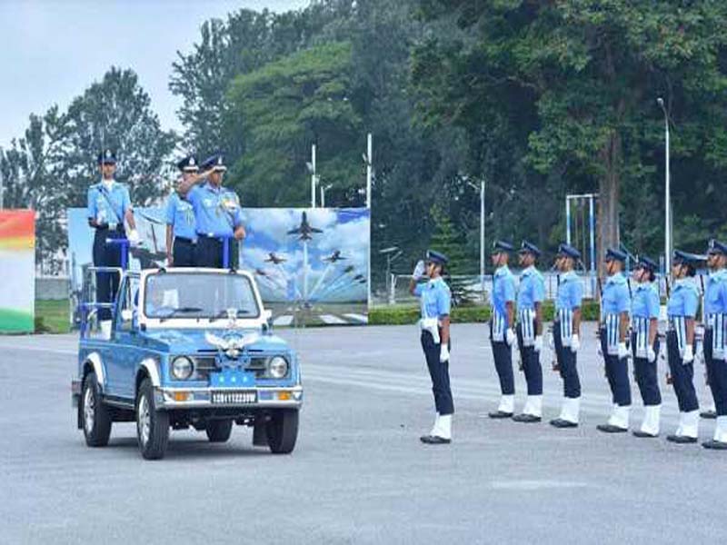 Air Marshal Mohan inspects the AFTC passing-out parade and recognizes outstanding graduates.