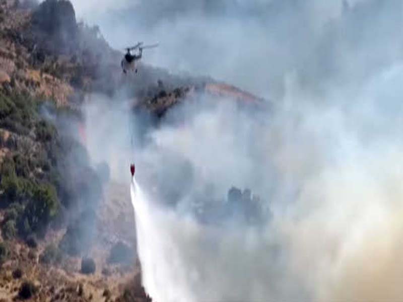 In western Turkey, a new wildfire breaks out, necessitating evacuations.