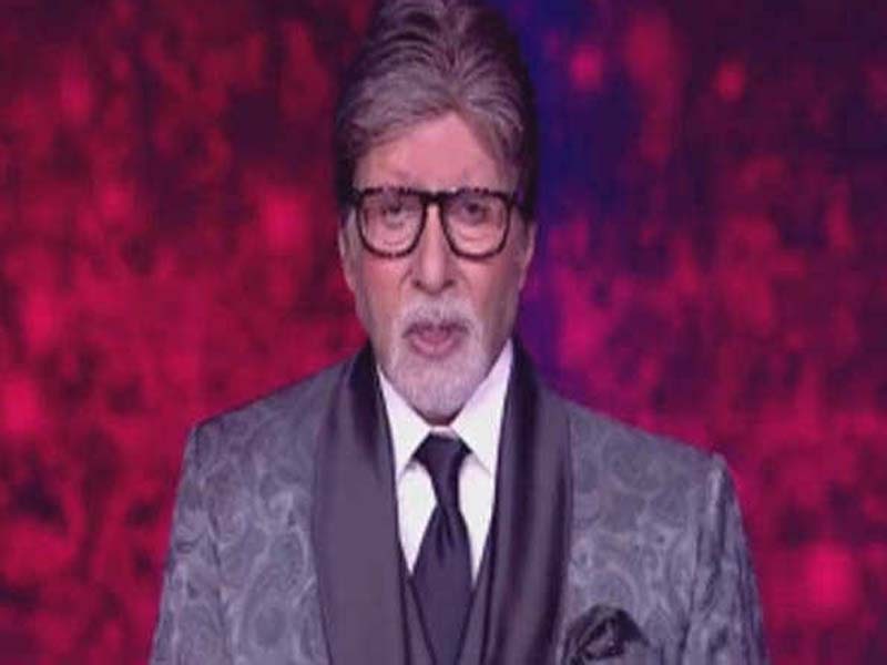 On KBC, Amitabh commends Abhishek for his commitment to community work.